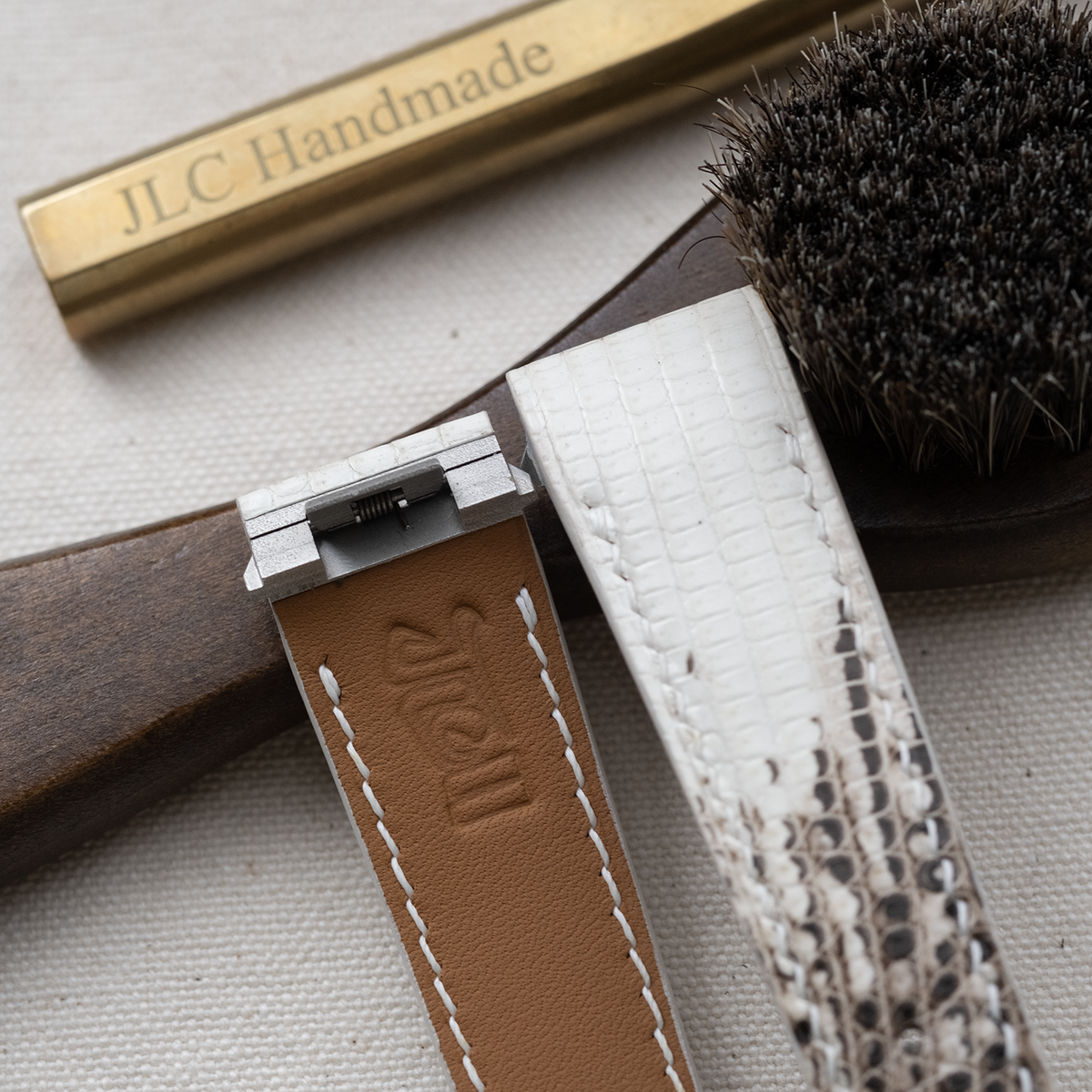 Quick-switch adapter detail on custom Cartier Roadster Himalaya lizard strap